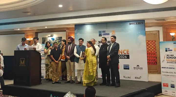 Award winners and guests on stage at the Amar Ujala School Excellence Awards 2026